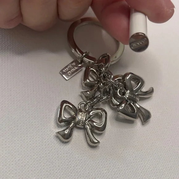 Elegant Coach Bow Keychain with Multicolor Crystals and a White Coach Pen - Picture 4 of 6